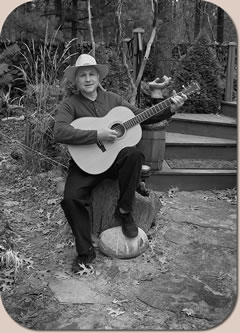 Bill Kehl playing a guitar